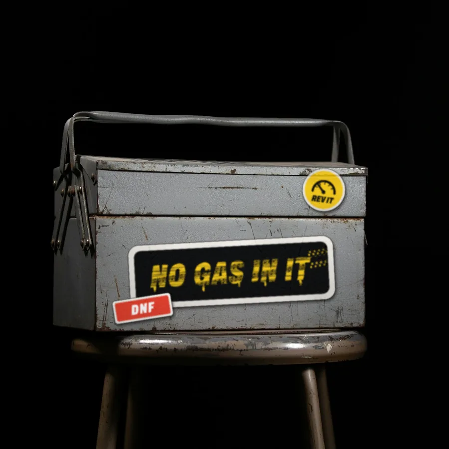 No Gas In It, Rev It and DNF stickers on the side of an old metal toolbox